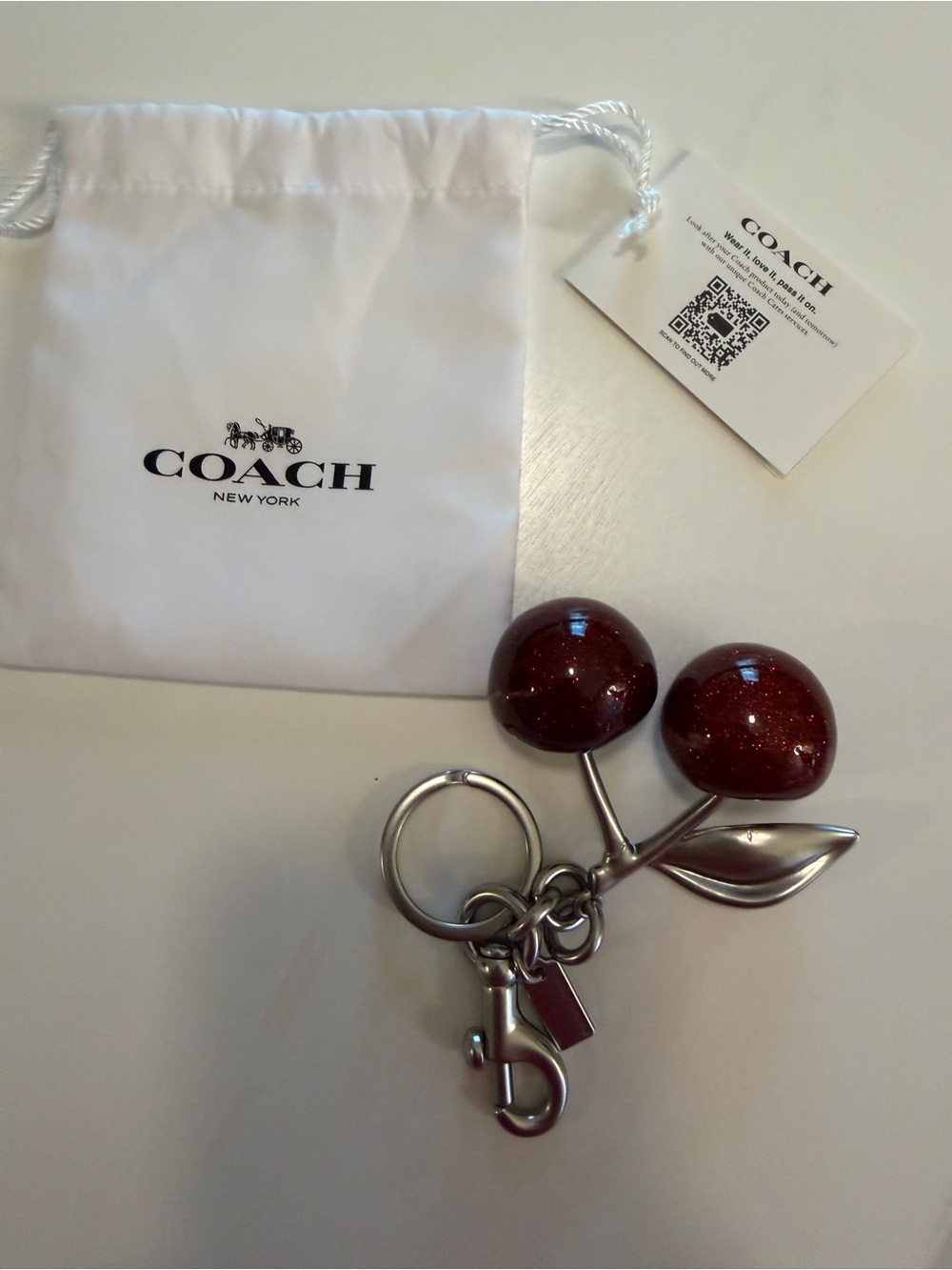 NWT Coach Glitter Cherry Bag Charm Keychain Silver Hardware Dust Bag